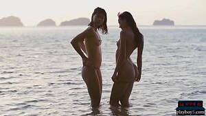 asian softcore lesbian - Lesbian Asian and European girlfriends playing in the ocean - XVIDEOS.COM