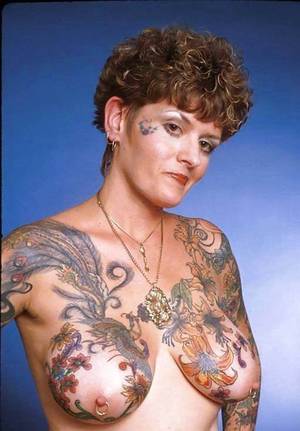 extreme tattooed boobs - XLLinky's sex videos & porn photo galleries.