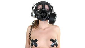 Gas Mask Girl Sexy - sexy woman with beautiful body dances with a gas mask covering her face.  Good clip