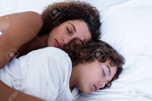 Boy And Mom Sleeping Porn - Close-up Of Mother And Son Sleeping Together On Bed Stock Photo, Picture  and Royalty Free Image. Image 54393083.