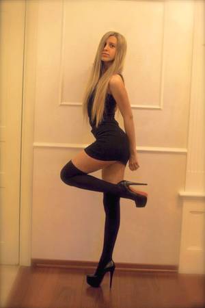 crossdresser lingerie video - Tall skinny blonde crossdresser in a tight black dress stockings and heels