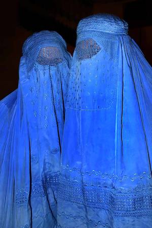 Afghanistan Women Burqa Porn - Afghan women wearing burqas, the most concealing of all Islamic garments,  with mesh shielding the eyes.