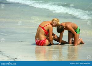 beach mother naked - Mother and son on beach stock photo. Image of water, breaks - 6092192