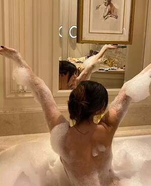 Lesbian Disney Porn Selena Gomez - Selena Gomez strips nude and covers curves in bubbles for steamy bath tub  selfie - Daily Star