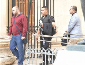 Maltese Private Porn - Mr Kingswell (centre) leaving court.