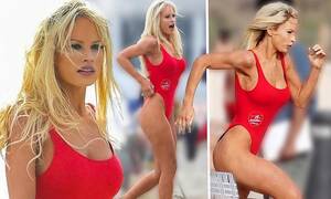 Baywatch Porn Fakes - Lily James the Baywatch babe slips into Pamela Anderson's iconic red  swimsuit (and wears fake bust) | Daily Mail Online