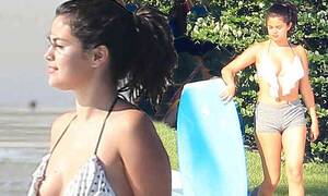 Beach Selena Gomez - Selena Gomez shows off her new curves in skimpy frilled bikini top | Daily  Mail Online