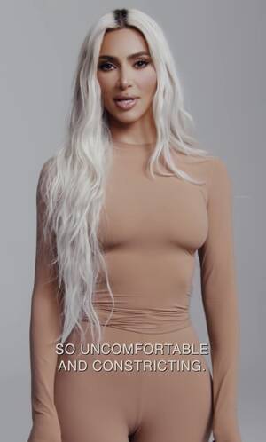 Kim Kardashian See Through Porn - Kim Kardashian attempts to cover up nipples in see-through black bra for  racy new SKIMS ad | The US Sun