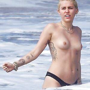 boob tit miley cyrus - Miley Cyrus Naked At The Beach - tits