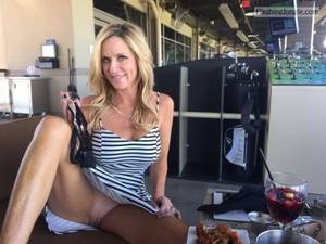 milf restaurant upskirt - Very attractive blonde milf pantyless at restaurant