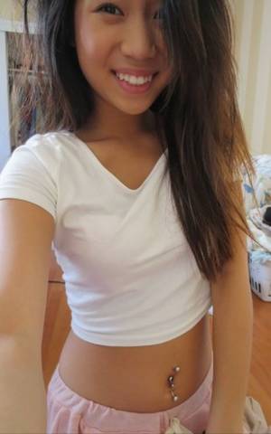 asian whore selfie - Tanned Thai slut with a beautiful face.