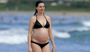 anne hathaway topless beach - Candids of a pregnant Anne Hathaway at the beach in Hawaii! Not a big fan  of the pregnant look but I like the pokies.
