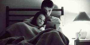 Husband And Wife Watch Porn Together - couple watching TV in bed