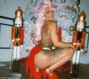 Blac Chyna Stripping Porn - Blac Chyna strips down to a thong with a big red bow on the back for  Christmas | Daily Mail Online