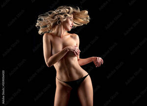 black people boobs nude - Beautiful young sexy model in black lingerie covered boobs. Sexy blonde  girl posing in studio. Sensual naked woman with perfect slim body covering  breast. Hair movement. Stock Photo | Adobe Stock