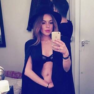 Big Boob Porn Lindsay Lohan - Lindsay Lohan shows off her boobs in sheer lacy bra just days after posing  topless - Irish Mirror Online