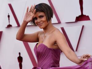 Halle Berry Porn Stories - Halle Berry Poses in Leopard Print Bodysuit, Boots: See Sexy Photos