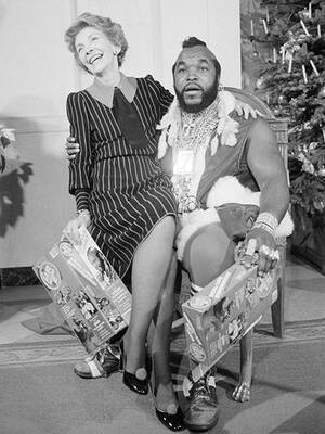 Nancy Reagan Porn - Ho ho ho! Mr. T dressed as Santa, with First Lady Nancy Reagan in the  Whitehouse. : r/80s