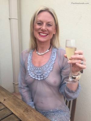 mature dress tits - Sexy granny cheers in see through dress