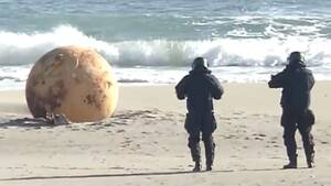 couple nudist beach enormous breasts - Huge mystery metal sphere discovered as cops close beach â€“ can you work out  what it is? - Daily Star