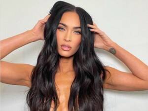 Lesbian Sex Megan Fox - Megan Fox goes braless in white tank top and diamantÃ© harness