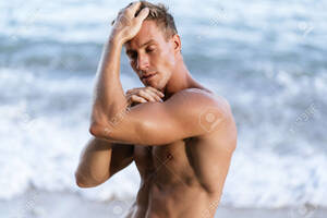 close up beach nudes - Close Up Portrait Of Sexy Muscular Naked Man Posing At Beach Stock Photo,  Picture and Royalty Free Image. Image 121840218.