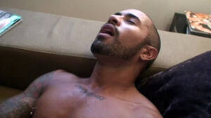 Man Jerk - Brazilian man with shaved head jerking off gay porn video on Alphamales