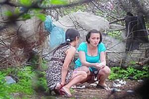 city voyeur - Girls filmed peeing in the city park by horny voyeur