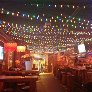 Anchorage Alaska - Photo of Koot's - Anchorage, AK, United States. Senior rose guy resting  under