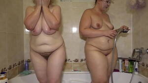 Fat Milf Lesbians Porn - Busty milf washes fat lesbian in the bath. Big ass, natural boobs, mature  pussy, and plump belly under the soapy foam. - XNXX.COM