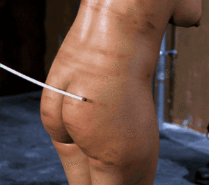 bare ass spanking legs spread against wall - Bareass Caning | BDSM Fetish
