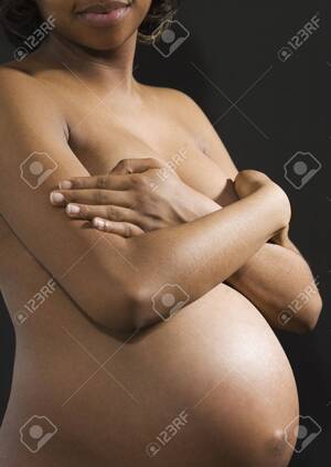 african american pregnant nude - Nude Pregnant African American Woman Covering Breasts Stock Photo, Picture  and Royalty Free Image. Image 35736860.