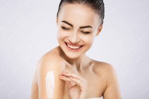 beautiful light ebony girls nude - Premium Photo | Pretty girl with black fixed hair behind, dark big eyes,  soft skin and naked shoulders using cream, a model with light nude make-up,  portrait, beauty photo, laughing.