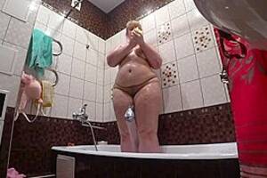 Bbw Lesbian Voyeur - Lesbian has installed a hidden camera in the bathroom at his girlfriend.  Peeping behind a bbw