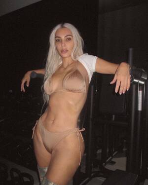 Kim Kardashian Ass Porn Captions - Kim Kardashian hits the gym in nude bikini and thigh-high boots