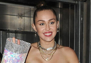 Miley Cyrus Porn Cum - Miley Cyrus Posts Naked Photo To Announce Woodstock 50 Performance