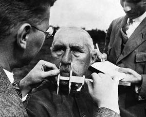 Aryan Nation Porn - A man having his nose measured during Aryan race determination tests. 1940