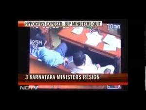 caught on tape - BJP MLA Caught on camera watching porn during parliment session - YouTube