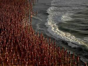 beach strip nude - Australia: Bondi beach goes nude for one day as thousands strip off for  Tunick's Sydney installation