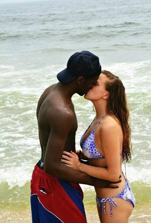 interracial kissing sluts - my wife kissing a nigga she met at the beachâ€¦