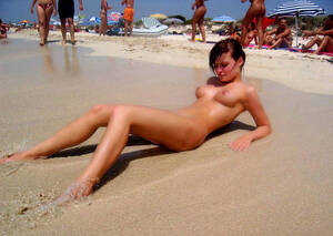 hot beach babes nude - Absolutely beautiful hot Russian girl with awesome tits is lying on the beach  nude â€” Russian Sexy Girls