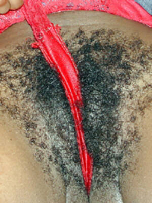 her black clit - She wants you to lick her black slit and clitoris.