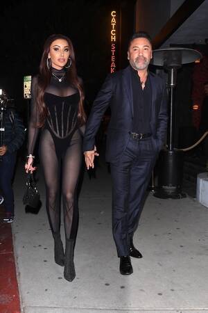 Angie Harmon Bondage Porn - OSCAR DE LA JOYA'S GIRLFRIEND GETS MORE ATTENTION THAN HE DOES â€“ Janet  Charlton's Hollywood, Celebrity Gossip and Rumors