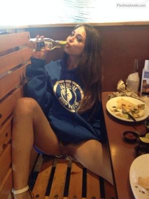 cheerleader upskirt pubic hair - Pantyless cheerleader Riley Reid drink beer in restaurant
