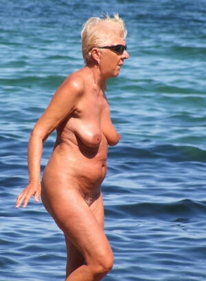 beach granny sluts - Amazing granny tanning on the beach fully naked show her awesome streched  cunt