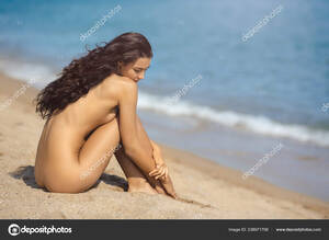 beautiful beach bodies nude - Nude beautiful woman on the nudist beach. Lady with nude perfect body.  Stock Photo by Â©dimabl 238971708