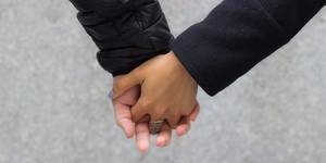 interracial couples holding hands - Interracial couples holding hands