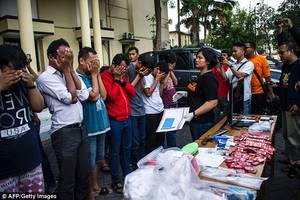 Minor Porn Indonesia - The group of men, covering their faces, were arrested for holding a 'gay