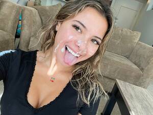 asian cum shot smile - Cum puts a smile on her face