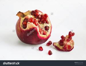Fruits - Pomegranate slices and seeds, pomegranate fruit - Shutterstock photography,  food photo, food porn